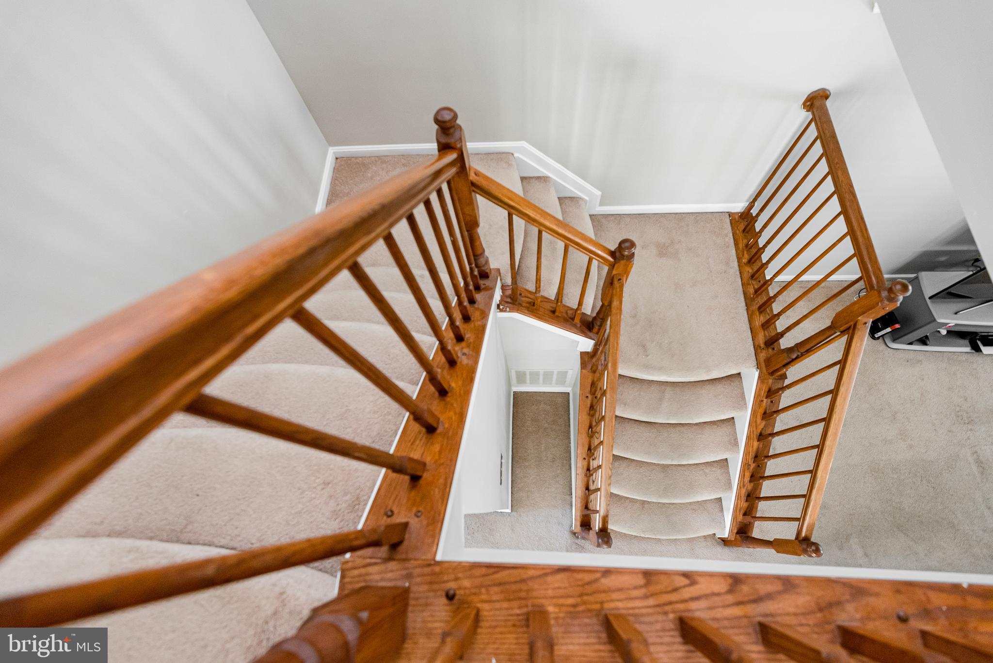 2115 Colonel Way Odenton, MD 21113 - Photo 30 of 63 View of stairs looking down from upper level