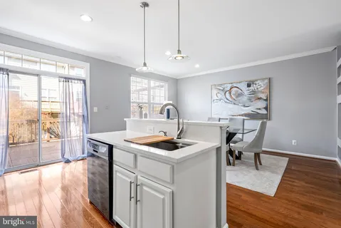 a view of a balcony with wooden floor