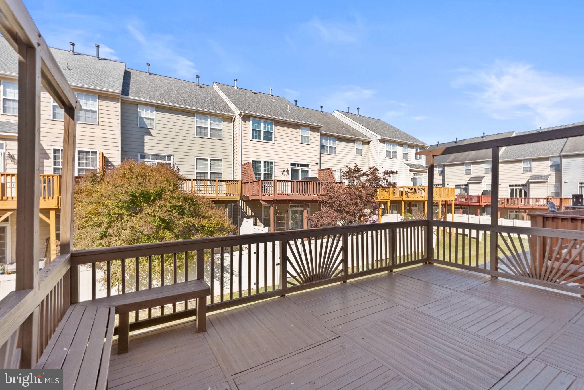13368 Ferry Landing Lane Woodbridge, VA 22191 - Photo 19 of 44 a view of a balcony with wooden floor