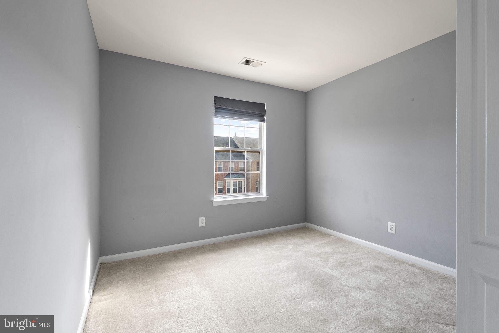 13368 Ferry Landing Lane Woodbridge, VA 22191 - Photo 26 of 44 a view of an empty room with a window
