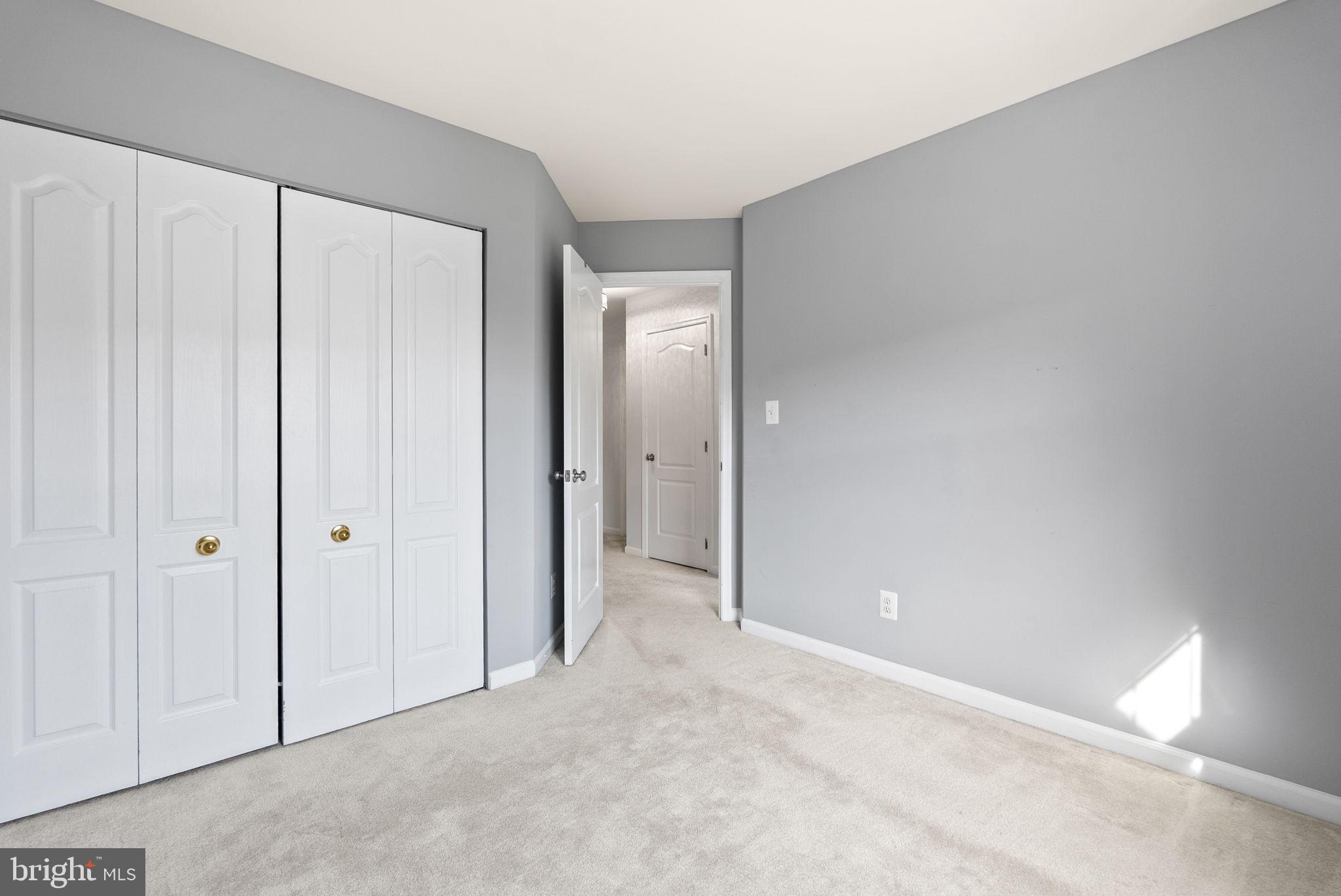 13368 Ferry Landing Lane Woodbridge, VA 22191 - Photo 27 of 44 a view of an empty room and closet area