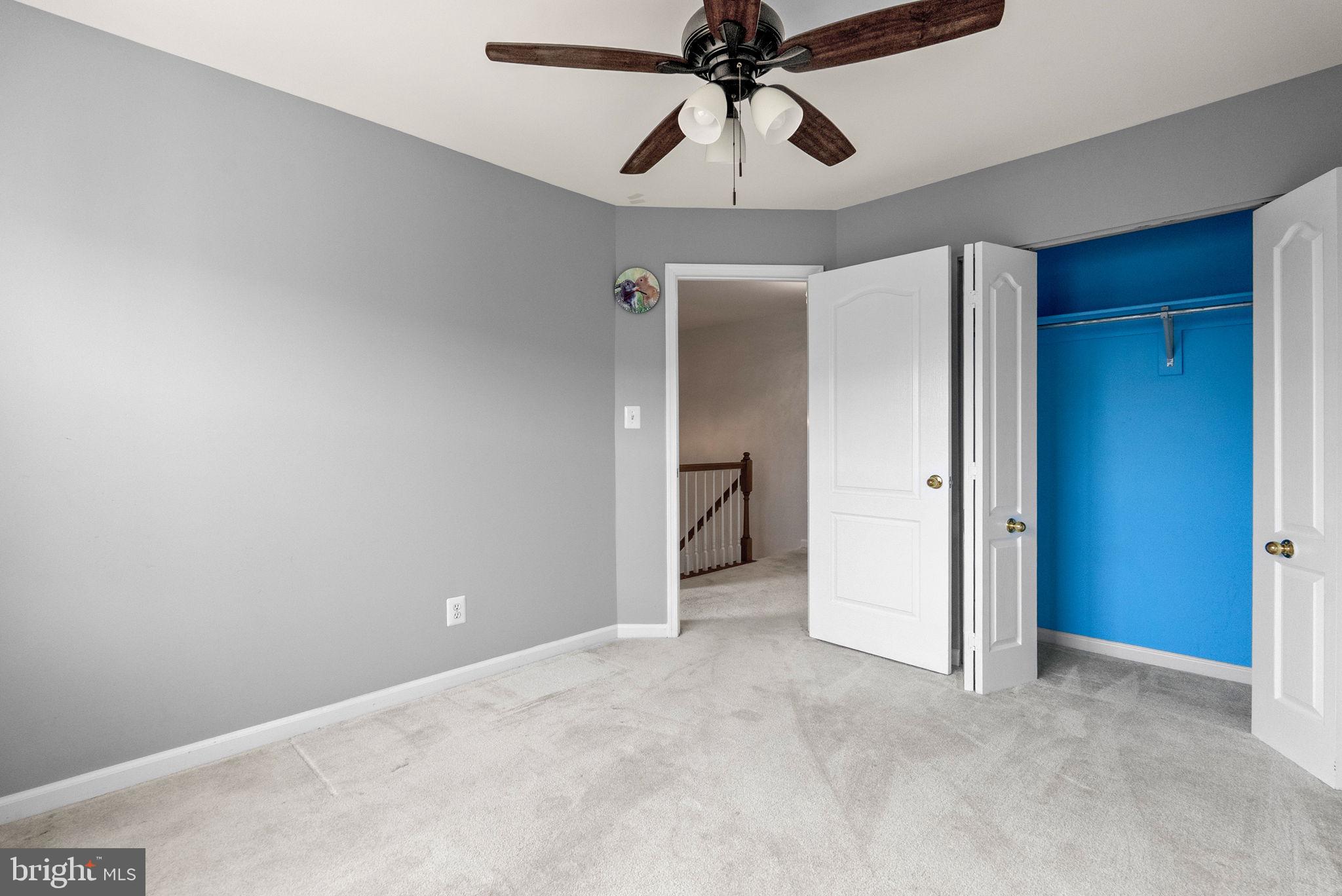 13368 Ferry Landing Lane Woodbridge, VA 22191 - Photo 29 of 44 a view of room with a ceiling fan and a chandelier fan