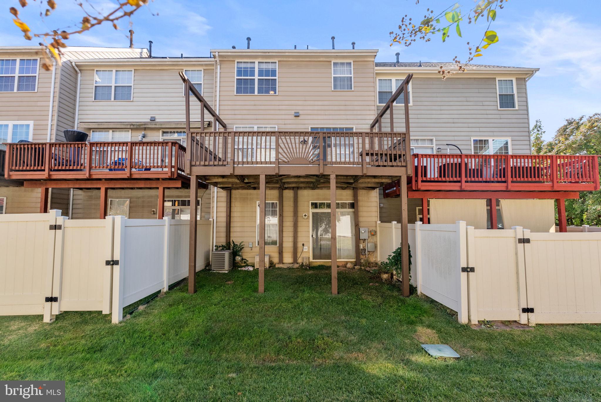 13368 Ferry Landing Lane Woodbridge, VA 22191 - Photo 36 of 44 a view of a house with a backyard