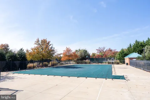 a view of a wrought iron fences in front of house
