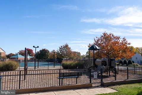 a picture of a bench in front of a door