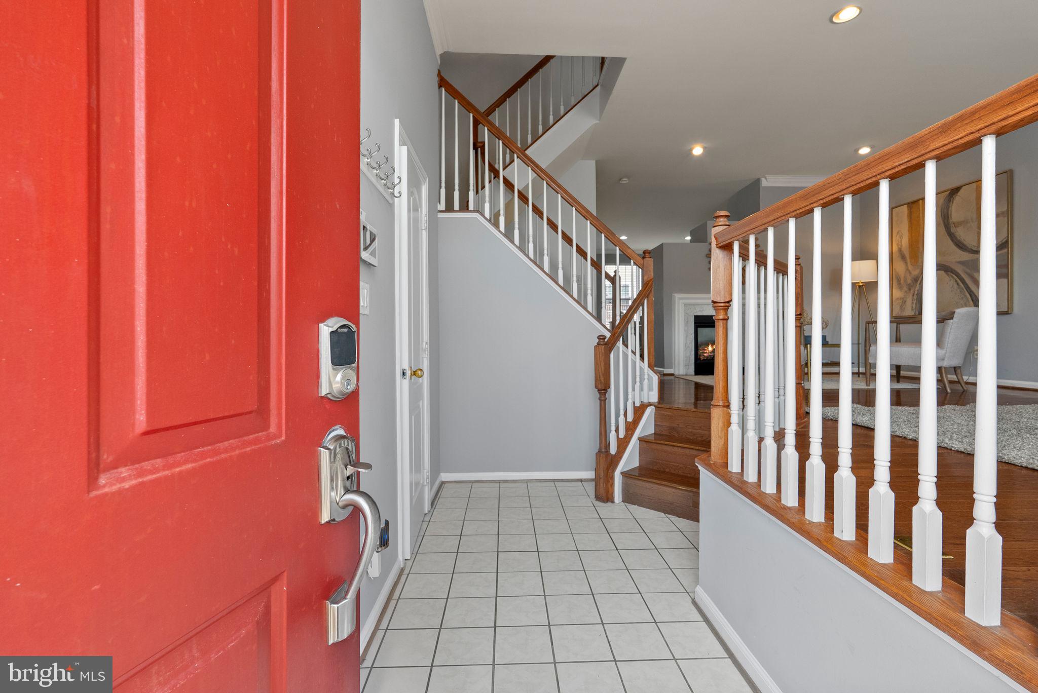 13368 Ferry Landing Lane Woodbridge, VA 22191 - Photo 6 of 44 a view of entryway with stairs and a rug