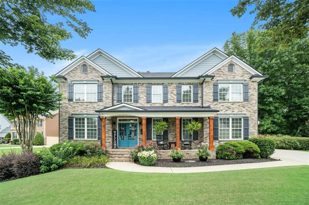 front view of a house with a yard