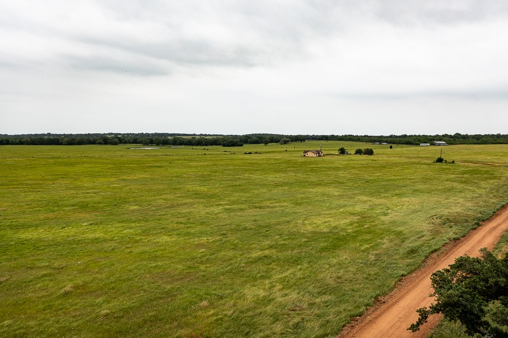 a view of an ocean from a mountain