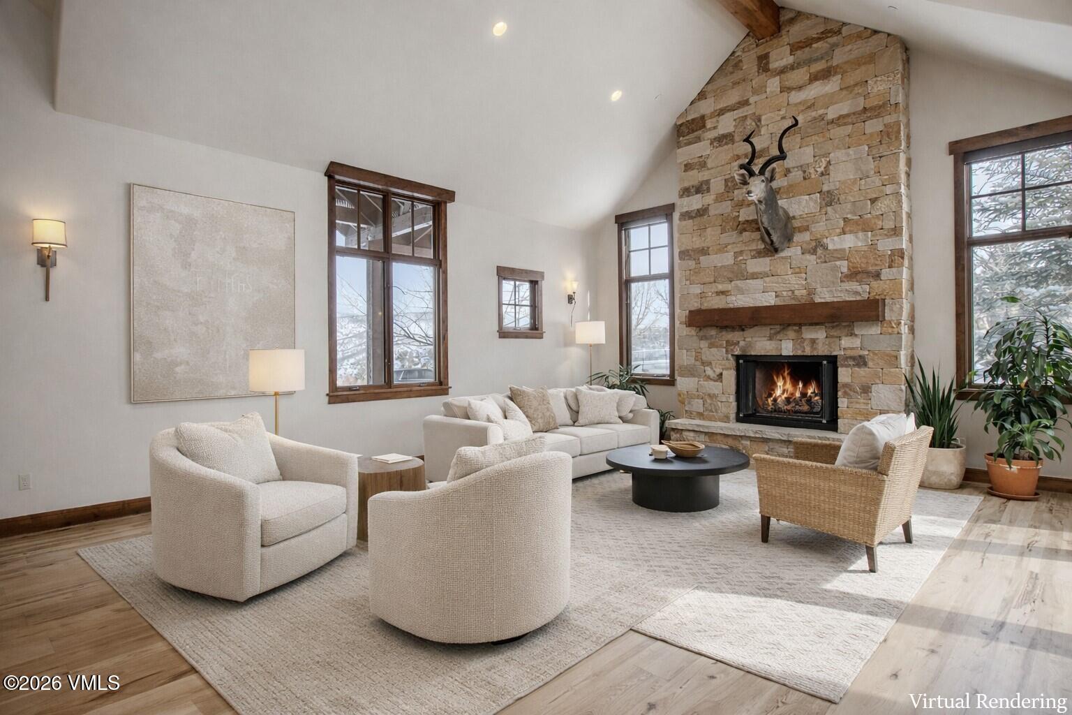 2753 East Haystacker Drive Eagle, CO 81631 - Photo 4 of 41 a living room with furniture and a fireplace