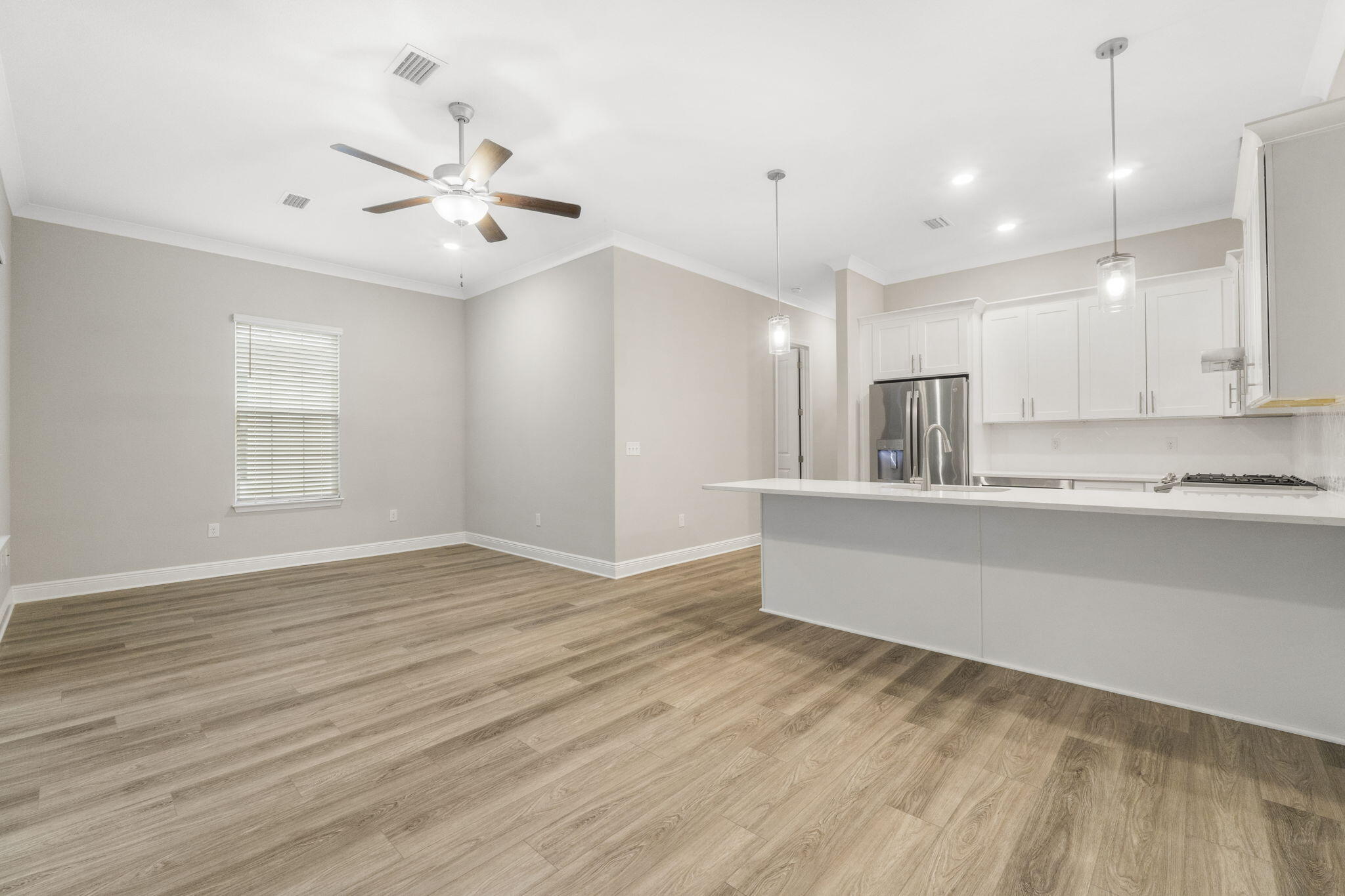 54 Kara Lake Drive Santa Rosa Beach, FL 32459 - Photo 13 of 41 a view of an empty room with kitchen and window