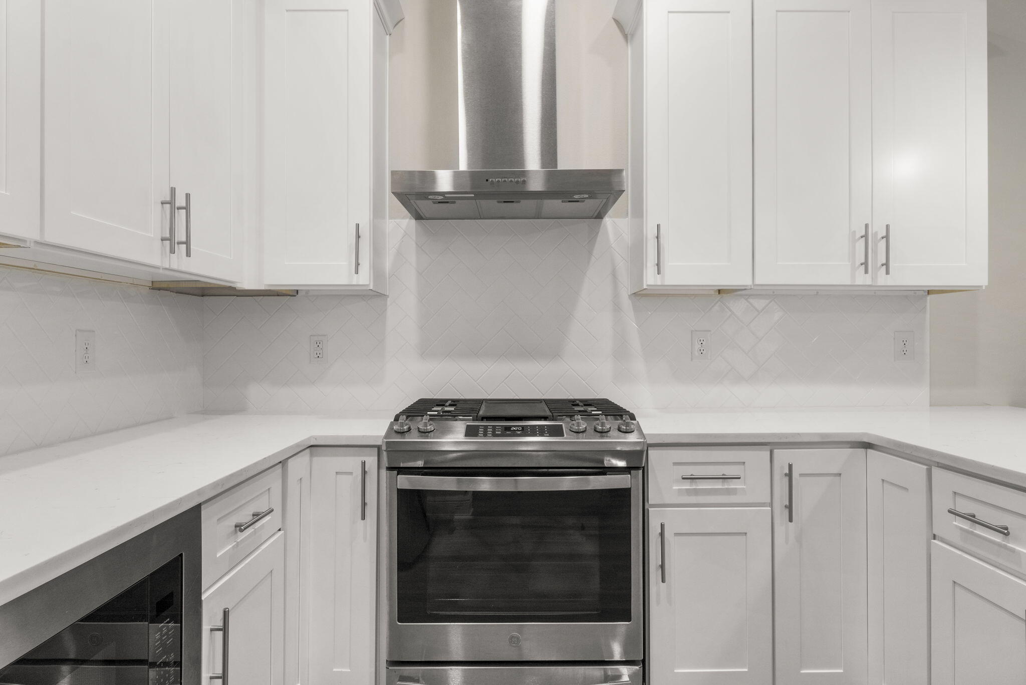 54 Kara Lake Drive Santa Rosa Beach, FL 32459 - Photo 16 of 41 a kitchen with granite countertop white cabinets and a stove
