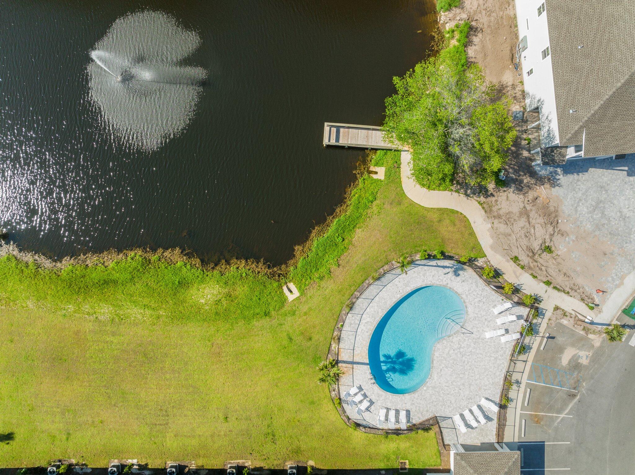 54 Kara Lake Drive Santa Rosa Beach, FL 32459 - Photo 38 of 41 a view of swimming pool with a garden