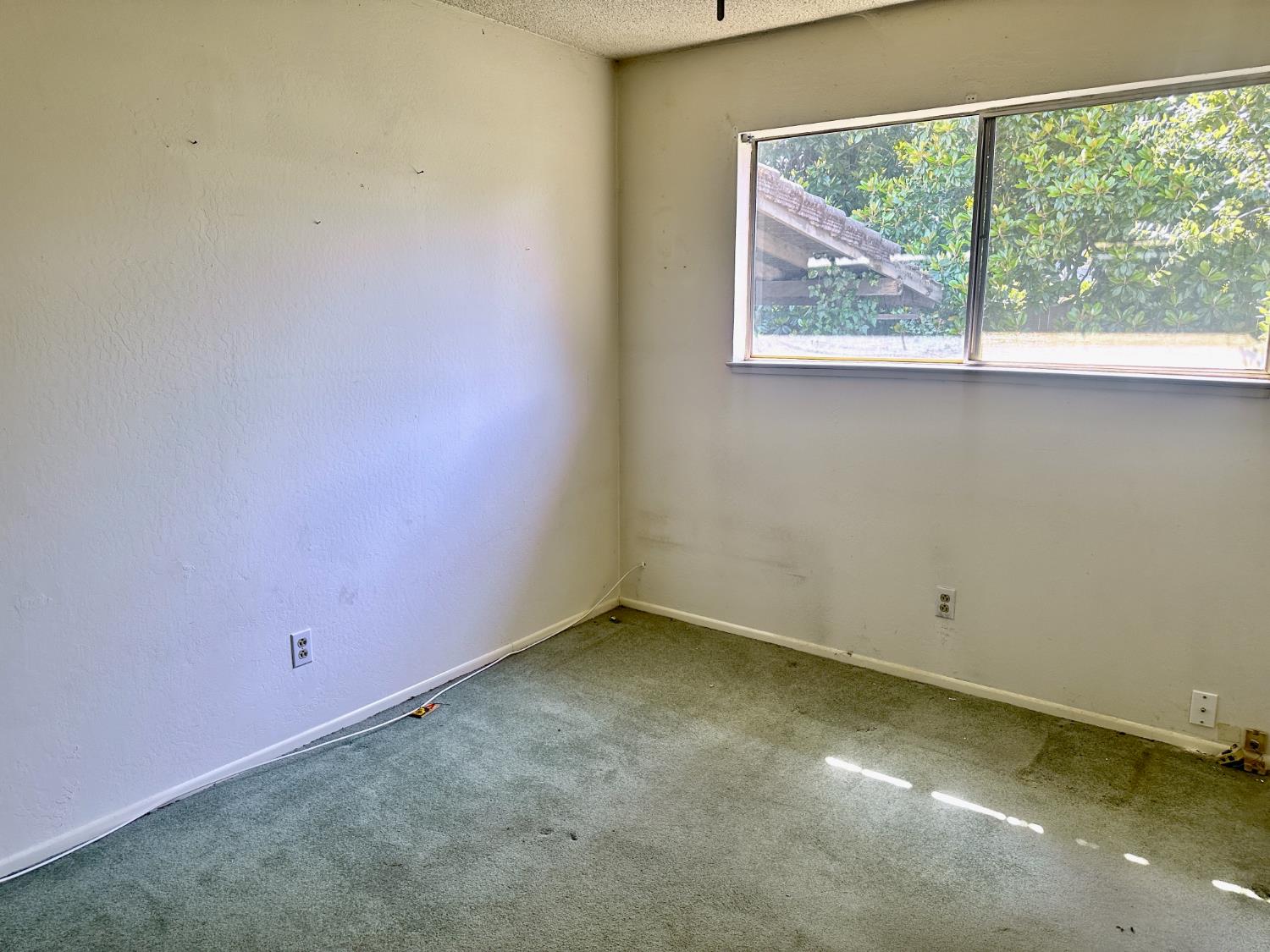 3207 Terry Way Carmichael, CA 95608 - Photo 16 of 36 an empty room with a window
