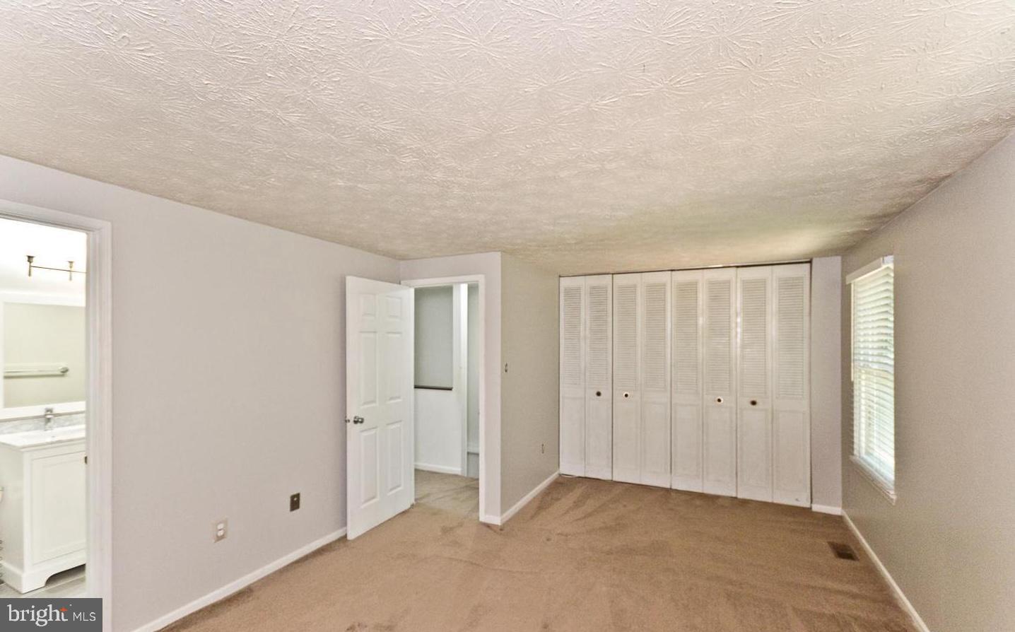 15781 Haynes Road Laurel, MD 20707 - Photo 22 of 34 Spacious, light-filled room with ample storage.