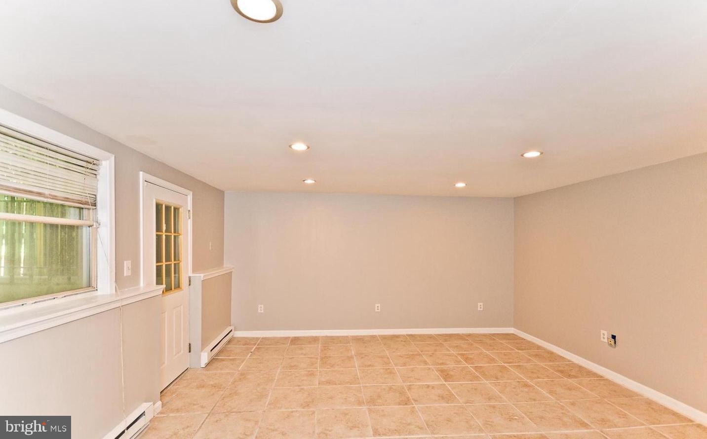 15781 Haynes Road Laurel, MD 20707 - Photo 26 of 34 Spacious, versatile room with natural light.