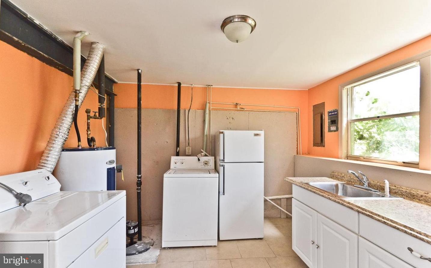 15781 Haynes Road Laurel, MD 20707 - Photo 27 of 34 Bright and functional laundry space awaits you.