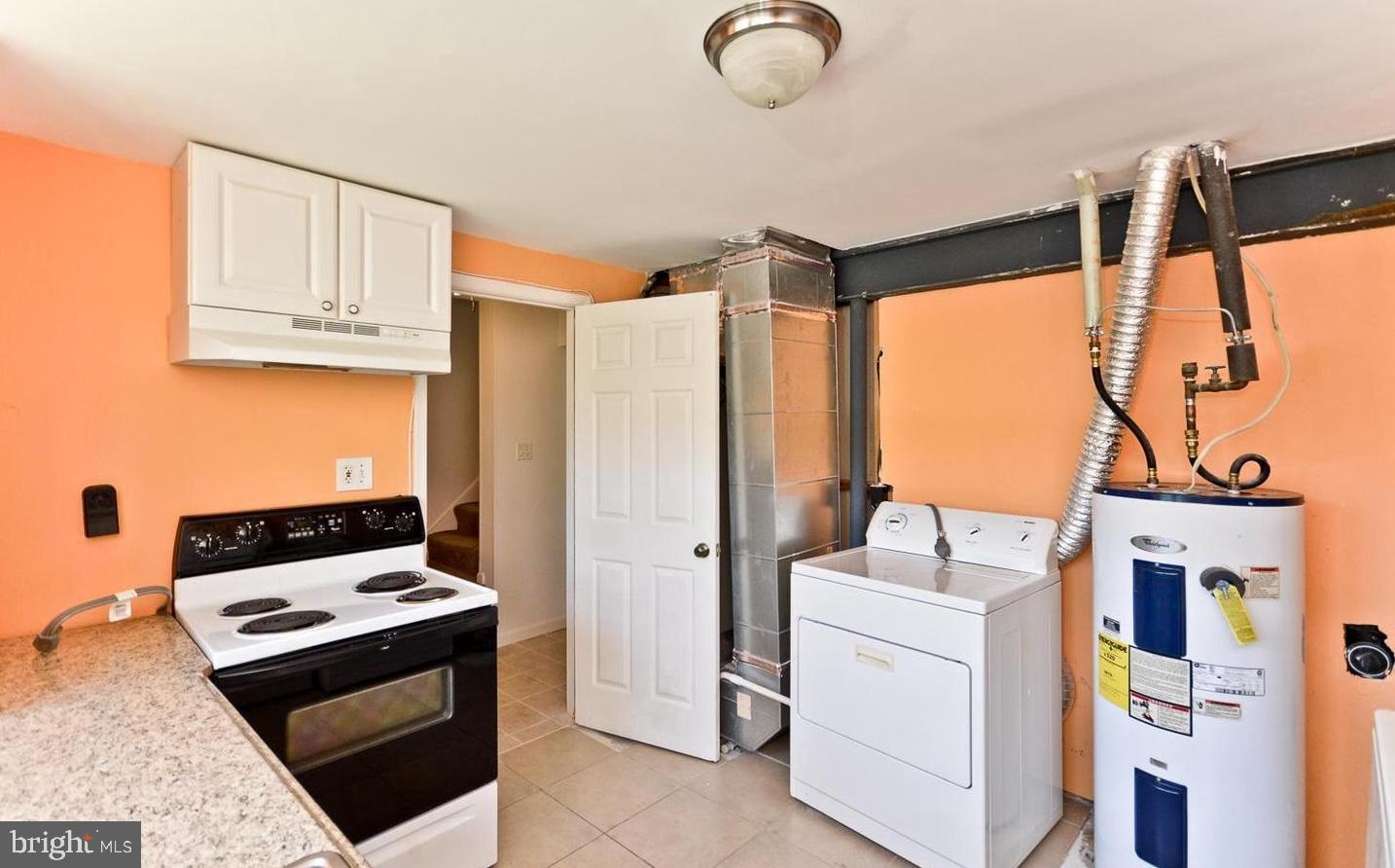 15781 Haynes Road Laurel, MD 20707 - Photo 28 of 34 Bright kitchen with laundry convenience.