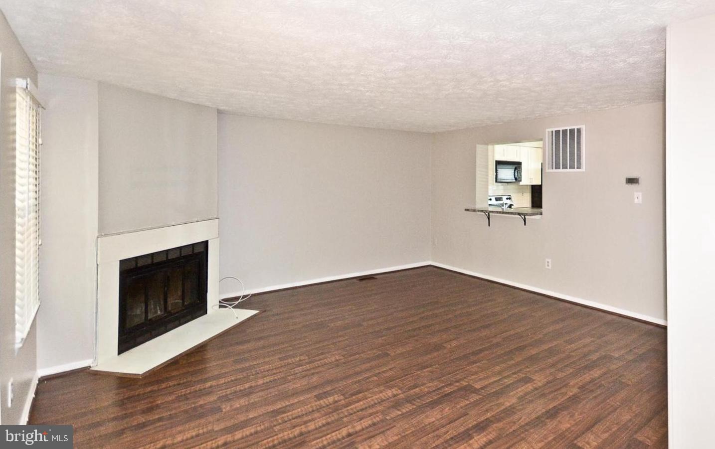 15781 Haynes Road Laurel, MD 20707 - Photo 6 of 34 Spacious living area with inviting warmth.