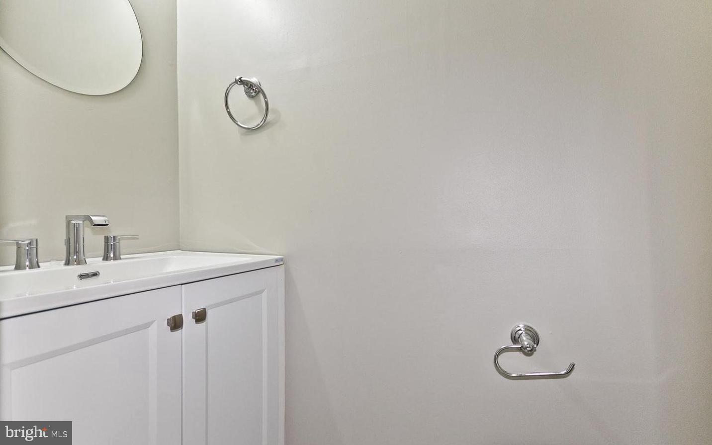 15781 Haynes Road Laurel, MD 20707 - Photo 9 of 34 Sleek and modern bathroom design.