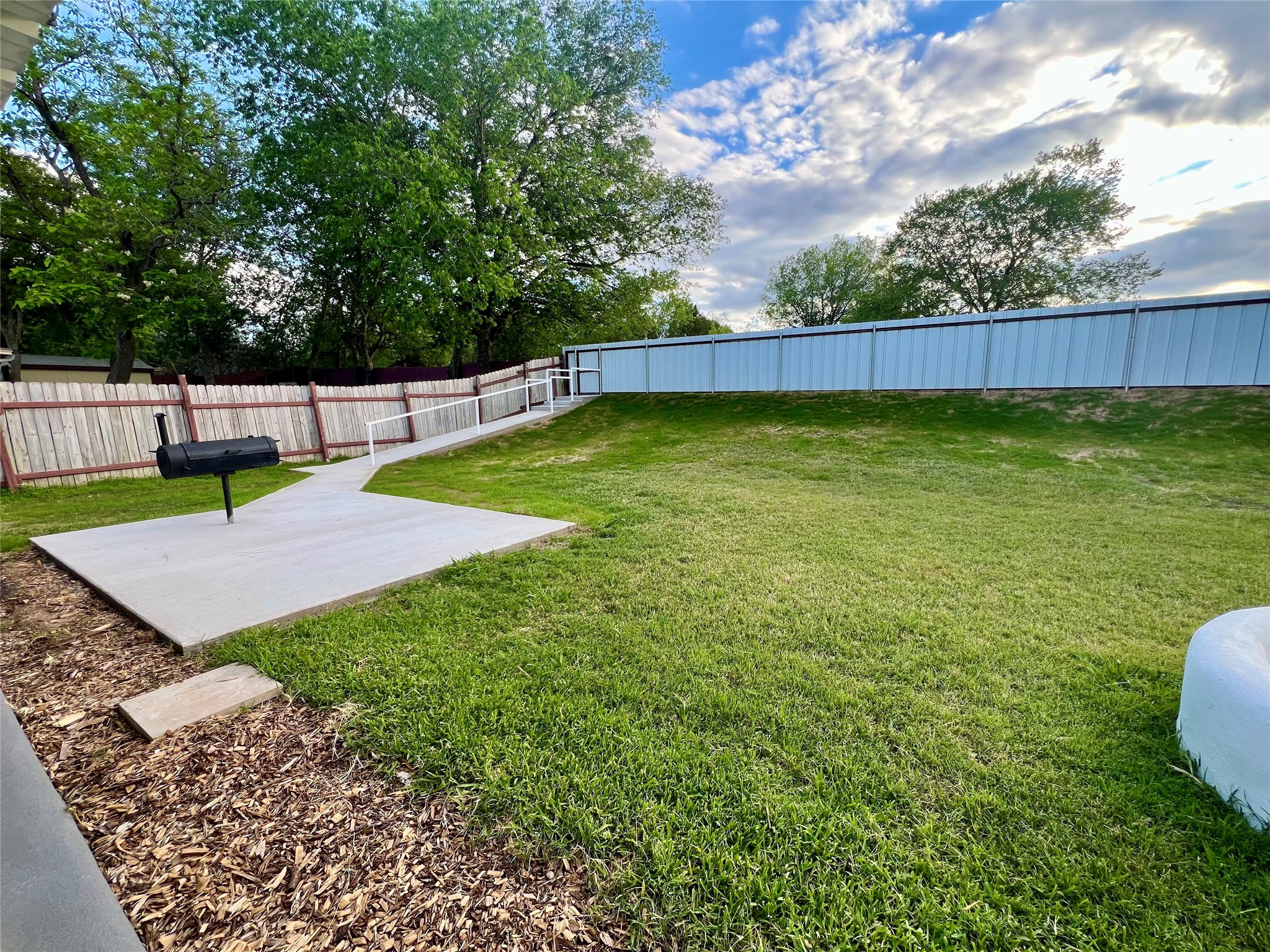 8007 Colony Loop Drive Austin, TX 78724 - Photo 32 of 40 Covered patio and built-in fire pit create an inviting outdoor gathering space.