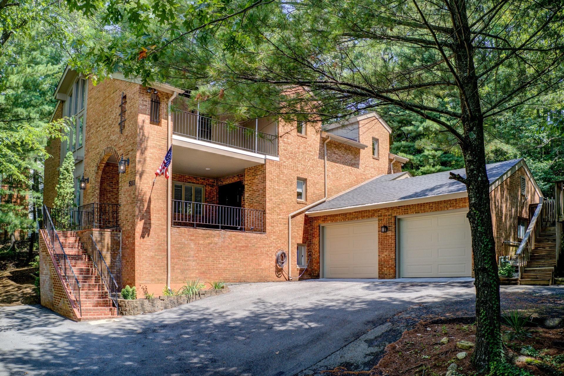 5111 Remington Road Roanoke, VA 24018 - Photo 1 of 1 a front view of a house with a yard