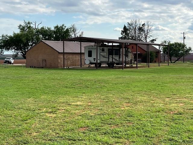 1163 State Highway 70 Rotan, TX 79546 - Photo 15 of 40 back corner toward the house and outbuildings
