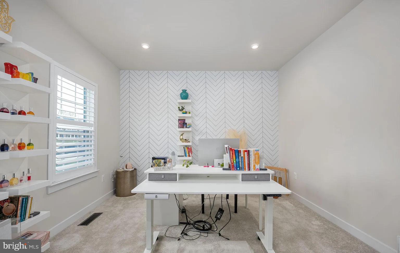 202 Grisham Road Stafford, VA 22554 - Photo 6 of 63 a view of a workspace with furniture and window