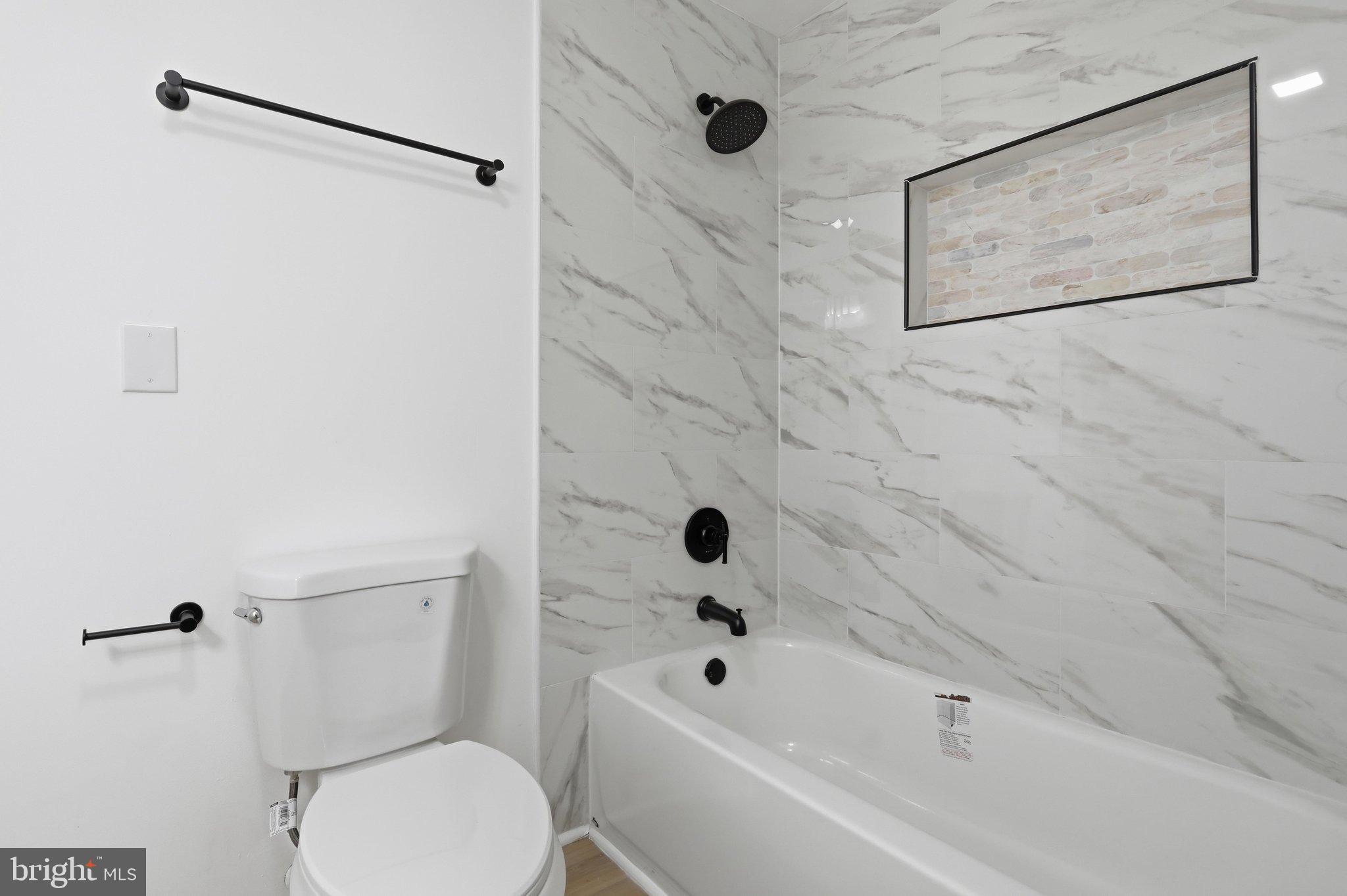 13835 McIntosh Circle Clear Spring, MD 21722 - Photo 17 of 32 Sleek bathroom with modern marble accents.