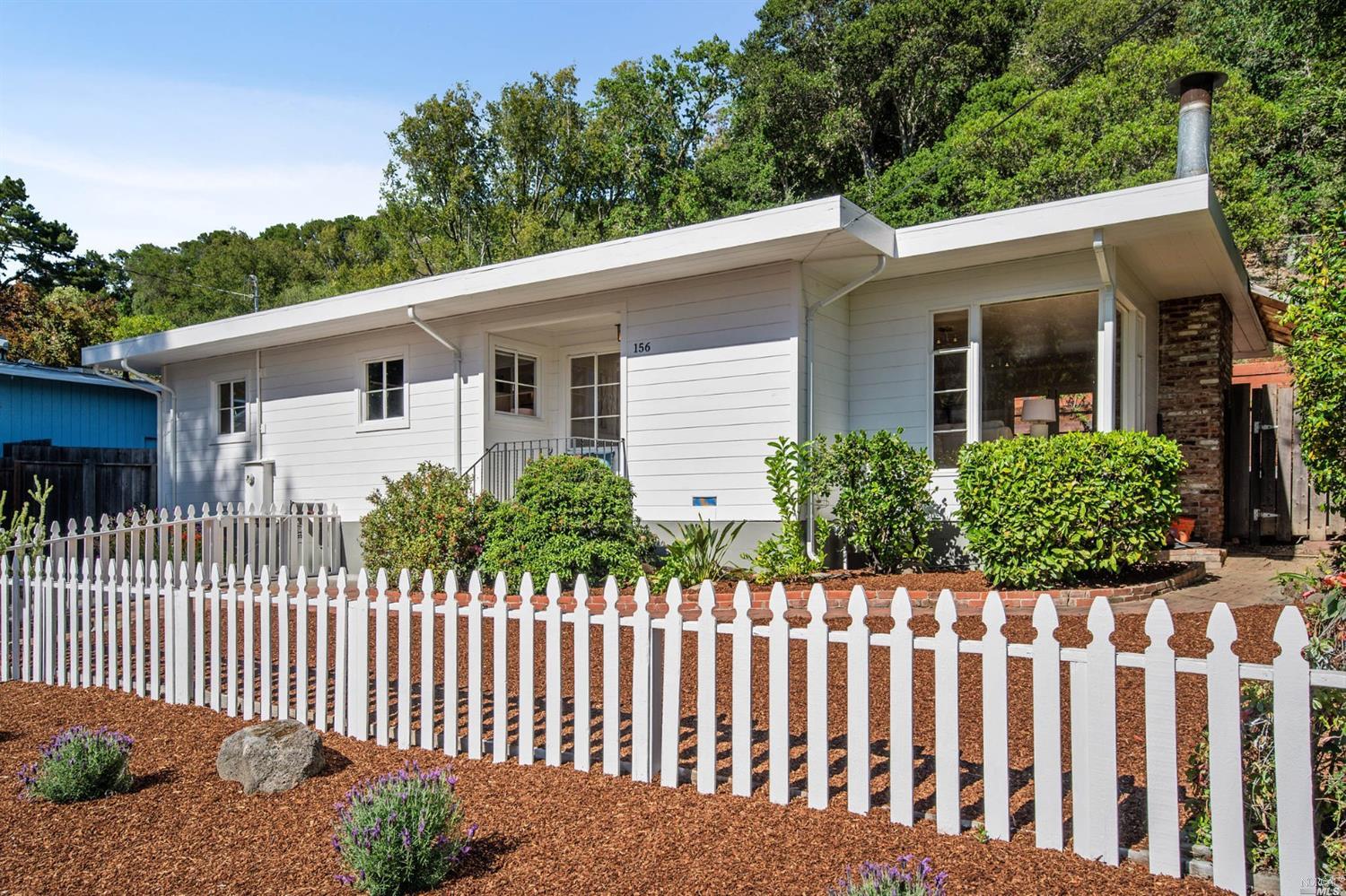 a front view of a house having yard