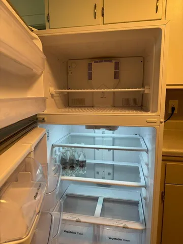 a kitchen with a sink stove and microwave