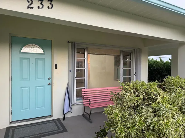 a front view of a house with porch