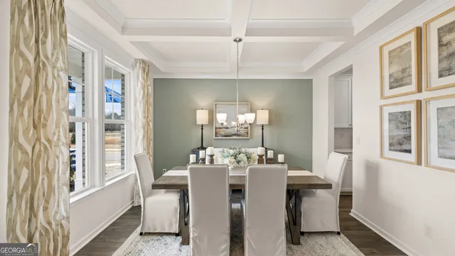 a view of a livingroom with furniture and a ceiling fan