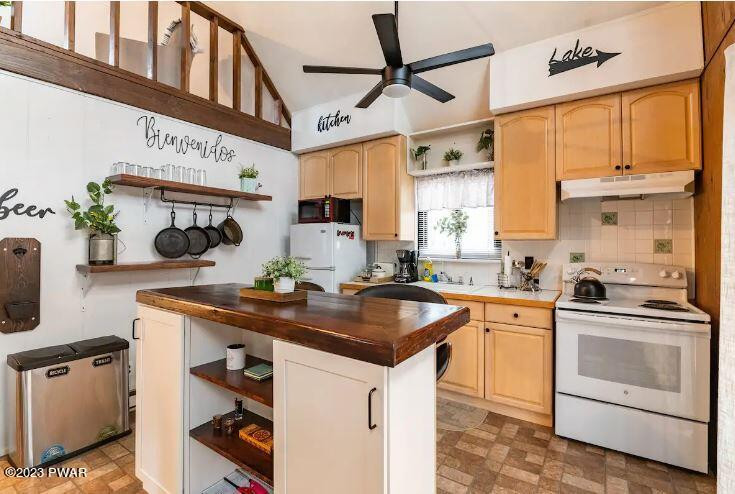 58 Rockway Road Lake Ariel, PA 18436 - Photo 5 of 33 a kitchen with stainless steel appliances granite countertop a sink a stove and a wooden cabinets