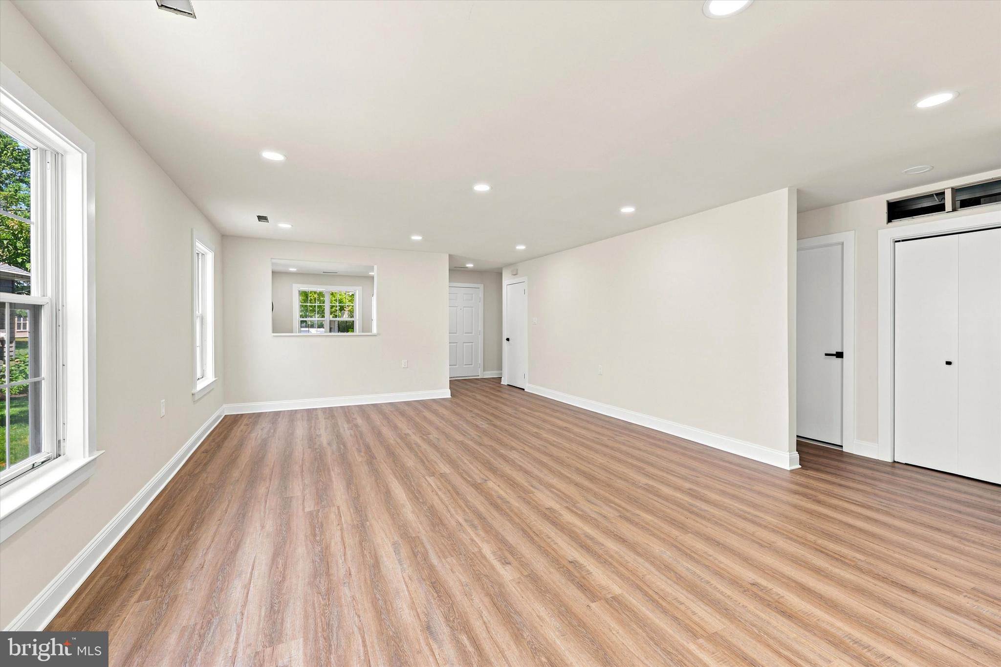 2 Emory Lane Mount Laurel, NJ 08054 - Photo 19 of 25 a view of an empty room with wooden floor and a window