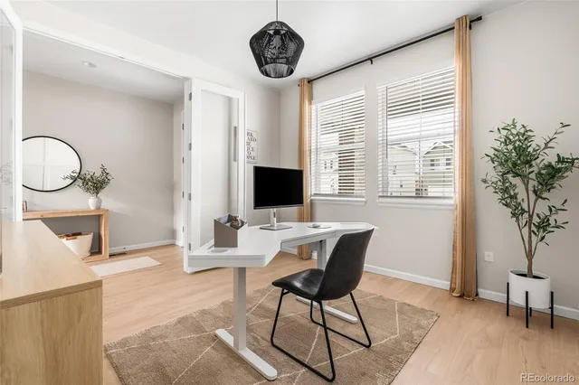 a view of a livingroom with furniture and window