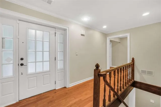 a bathroom with a sink a mirror and a bathtub