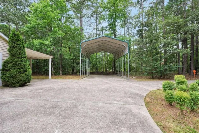 a view of a backyard with garden