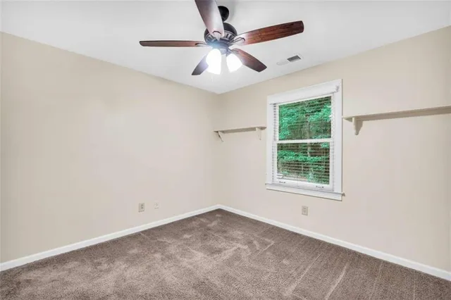 an aerial view of a house with swimming pool