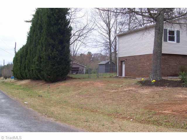 1001 West Dalton Road King, NC 27021 - Photo 2 of 8 Other. side of house and fenced yard
