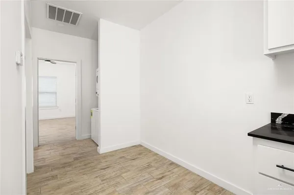 a view of small space with wooden floor