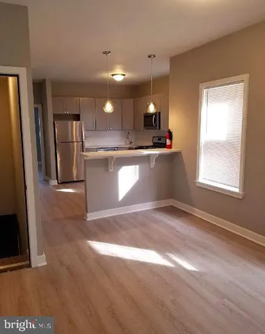 a view of kitchen and window