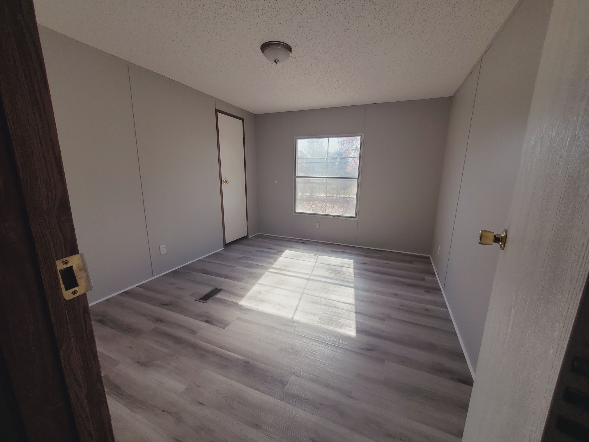 1108 Turkey Creek Road Dickson, TN 37055 - Photo 11 of 12 a view of empty room with wooden floor and fan