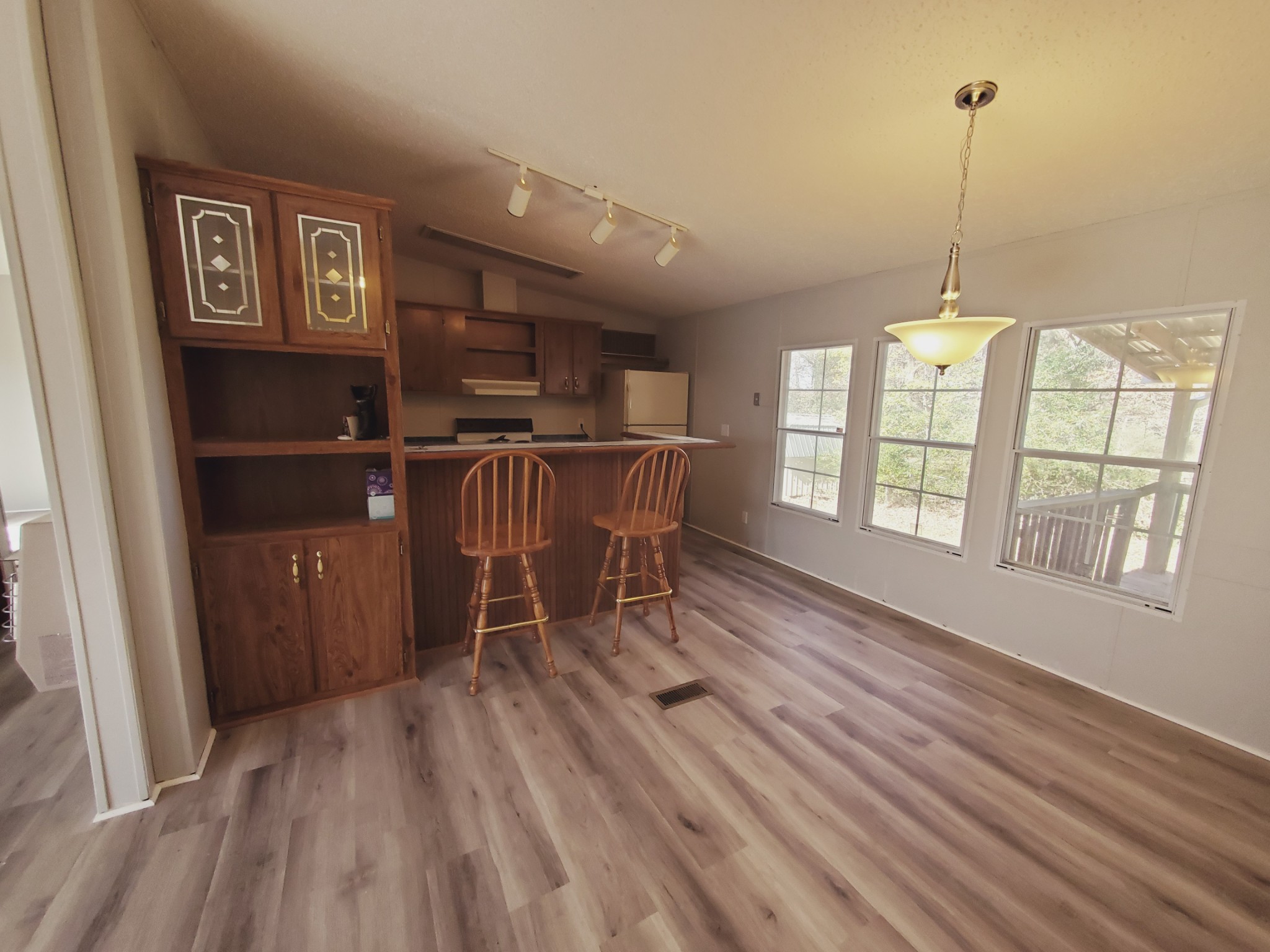 1108 Turkey Creek Road Dickson, TN 37055 - Photo 9 of 12 a view of a kitchen with furniture window and wooden floor