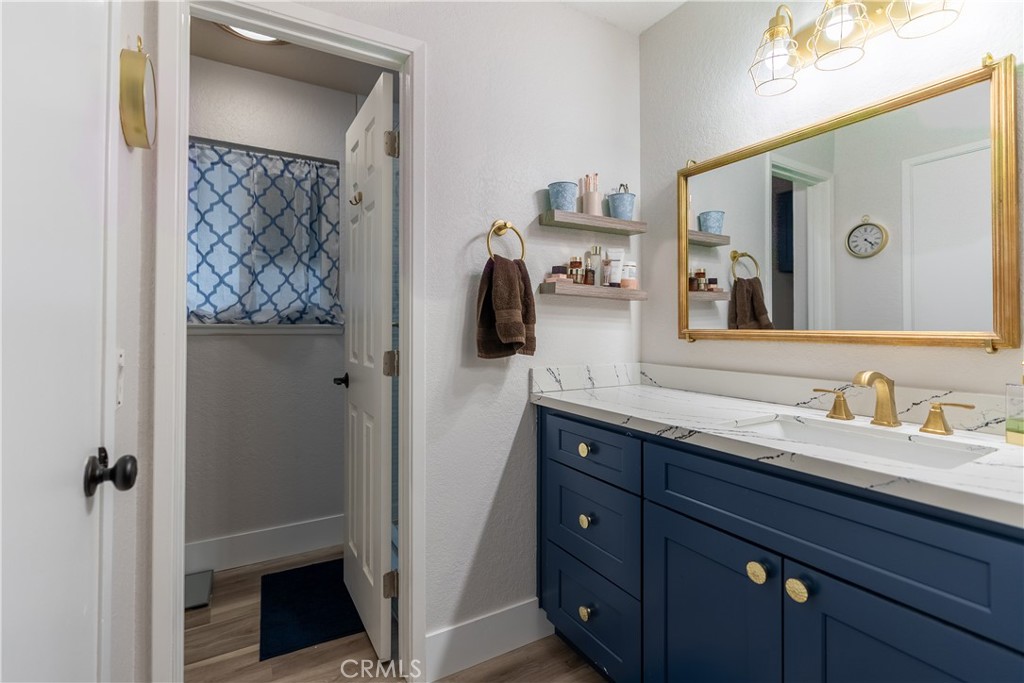 10328 Ivy Court Rancho Cucamonga, CA 91730 - Photo 11 of 40 a bathroom with a sink and a mirror