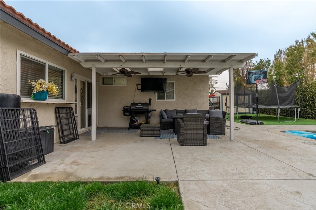 10328 Ivy Court Rancho Cucamonga, CA 91730 - Photo 36 of 40 a view of a patio with table and chairs