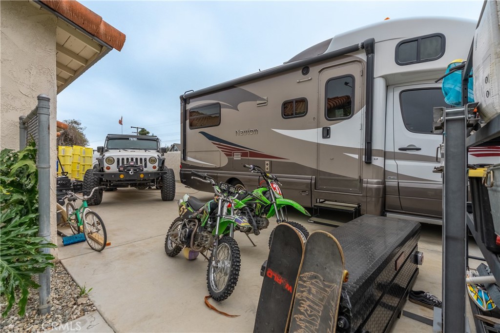10328 Ivy Court Rancho Cucamonga, CA 91730 - Photo 38 of 40 a view of a patio with table and chairs potted plants