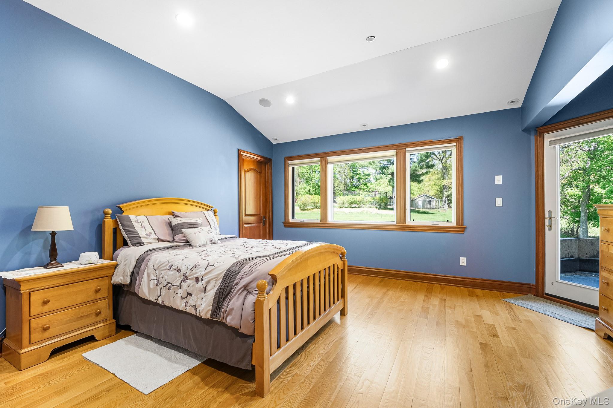 33 Winding Rd Farm Ardsley, NY 10502 - Photo 22 of 50 Bedroom featuring access to exterior, light wood finished floors, and lofted ceiling