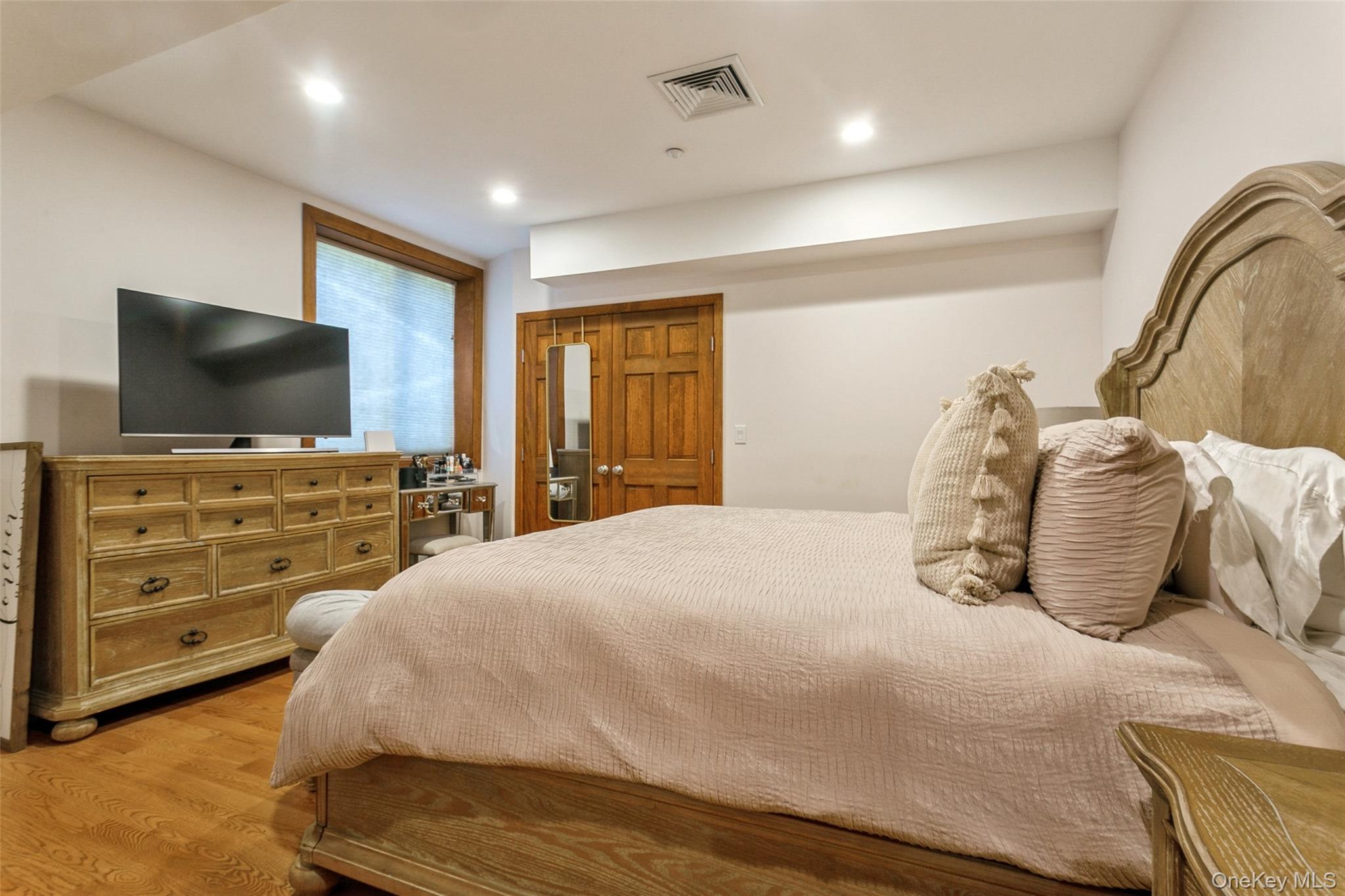 33 Winding Rd Farm Ardsley, NY 10502 - Photo 35 of 50 Bedroom featuring wood finished floors and recessed lighting