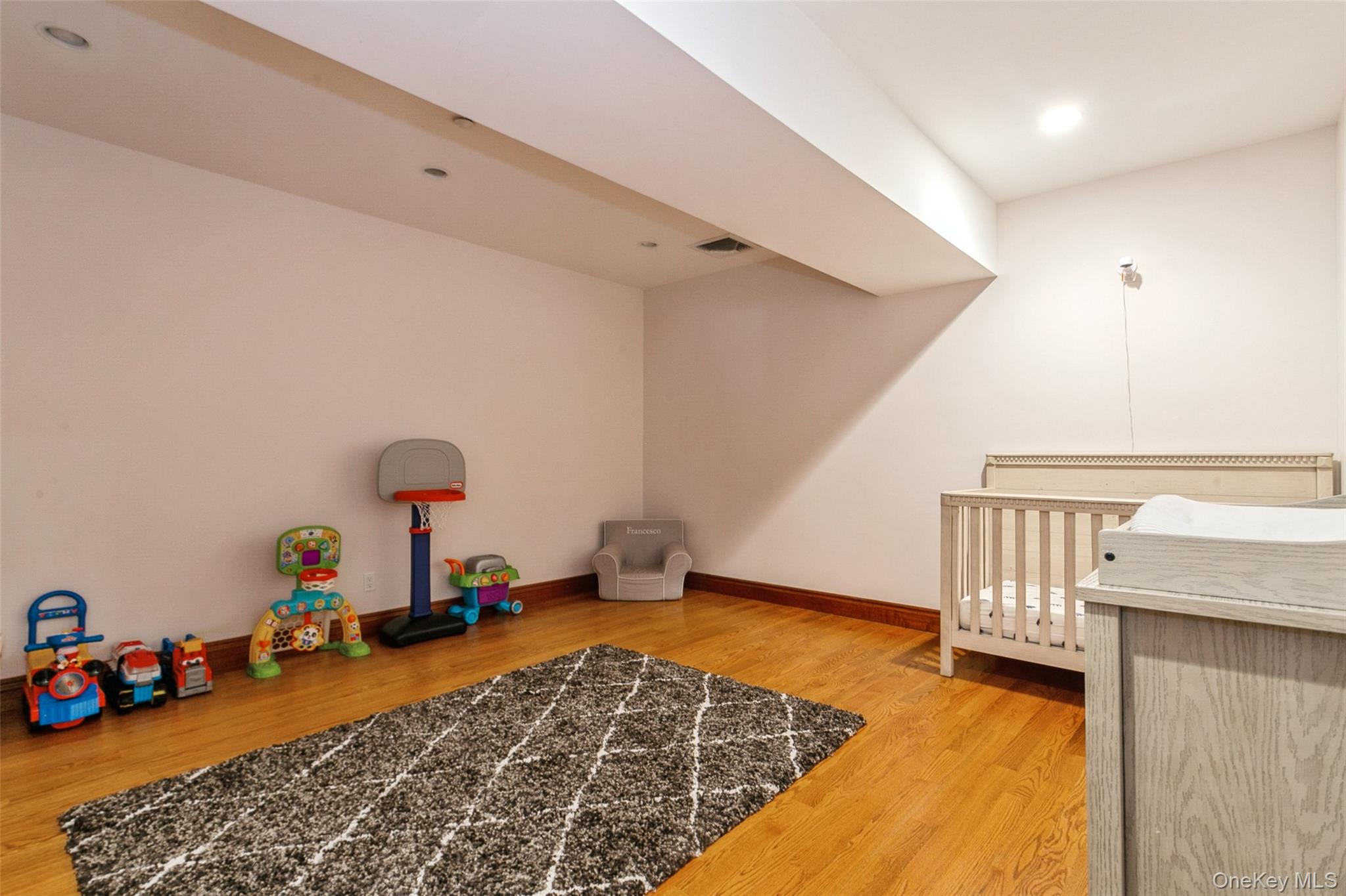 33 Winding Rd Farm Ardsley, NY 10502 - Photo 36 of 50 Bedroom featuring wood finished floors and baseboards