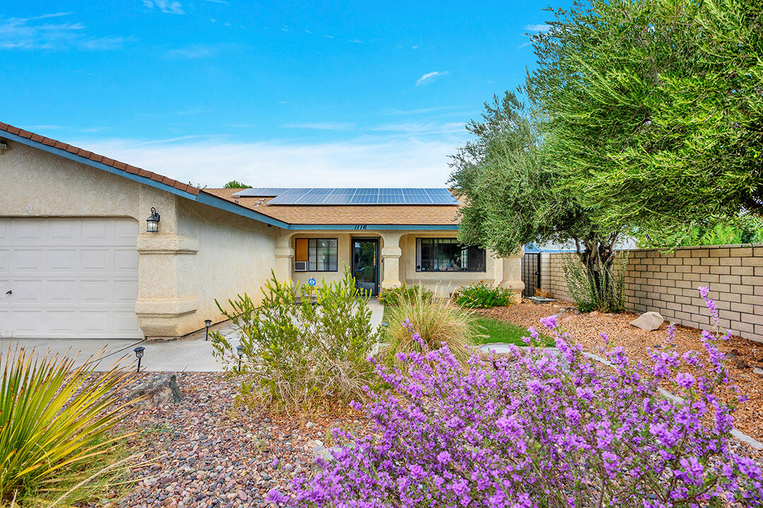 1116 West Tamarisk Avenue Ridgecrest, CA 93555 - Photo 1 of 1 a front view of a house with garden